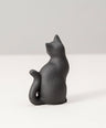 paperweight long-tailed cat 