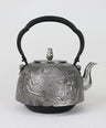 Iron kettle with cherry blossoms and small birds emblem